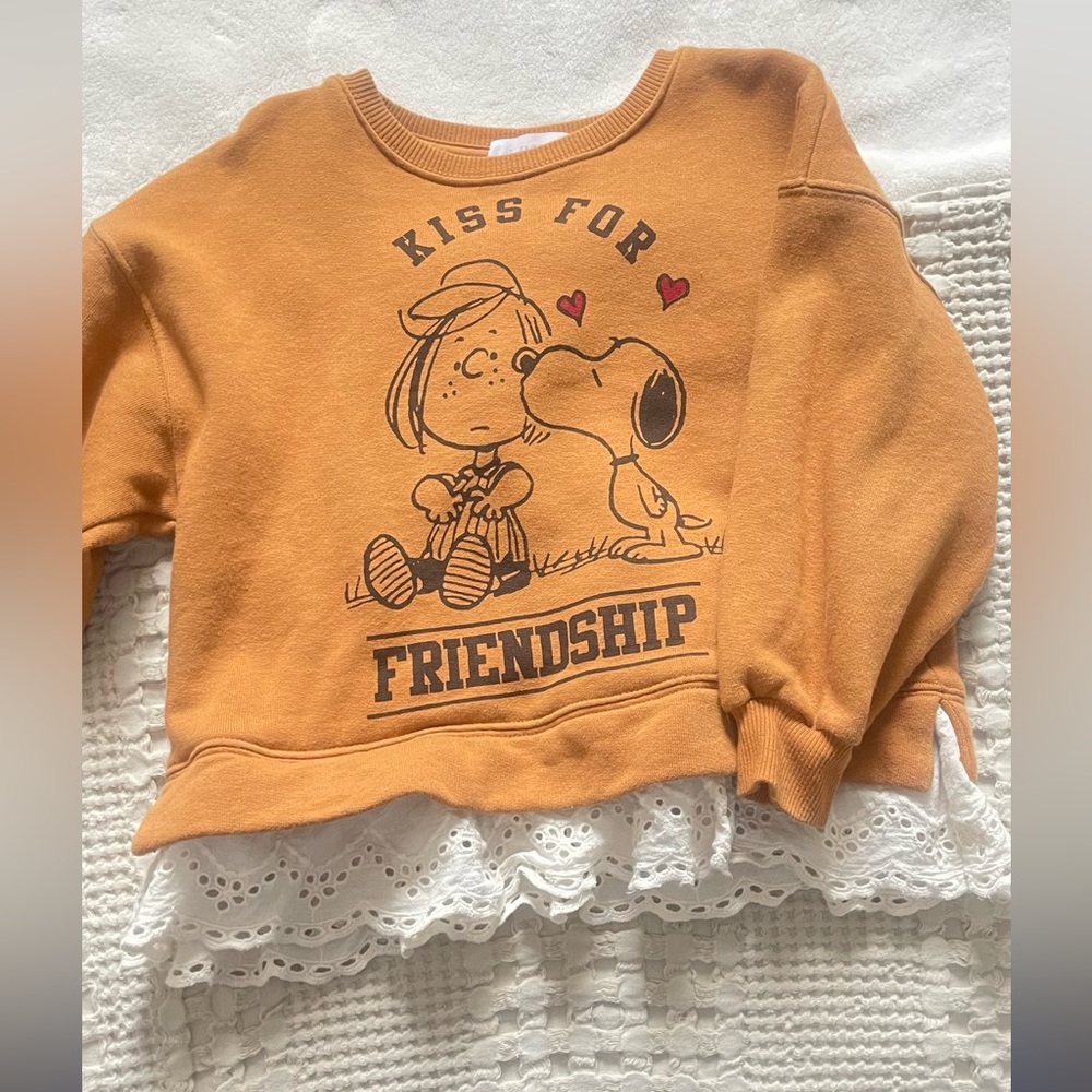 my daughter no longer has it, snoopy sweater in perfect condition